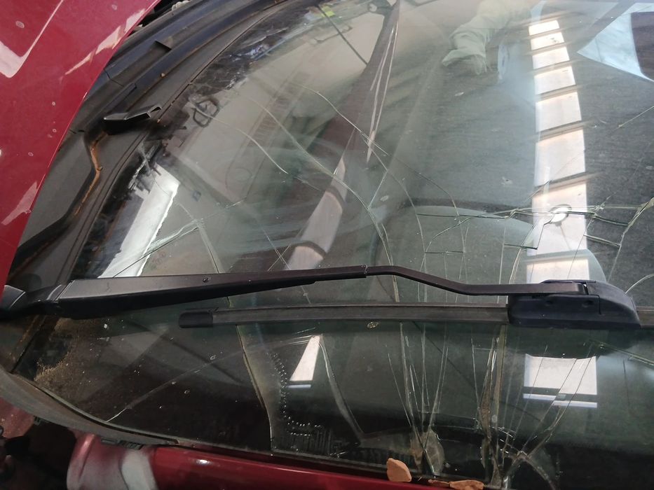 Haste / braço de escova limpa vidros frente esquerda NISSAN Micra V (K