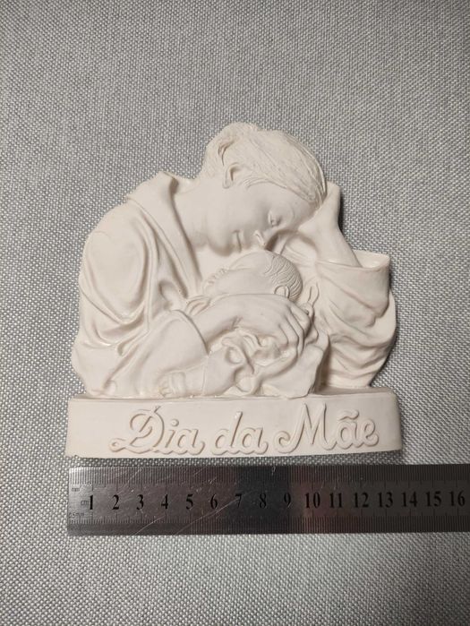 Peça em marfinite para a mãe