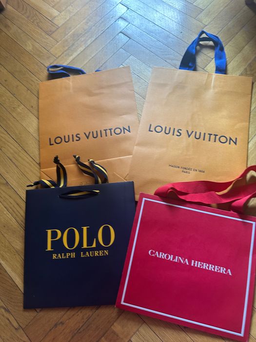 Брендові пакети Louis Vuitton, Prada, Valentino…