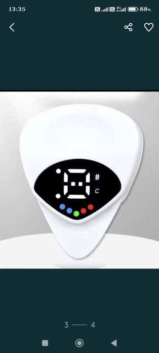 Гитарный тюнер-медиатор