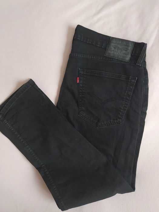 Spodnie jeansowe Levis 502 czarne jeansy
W36 L32