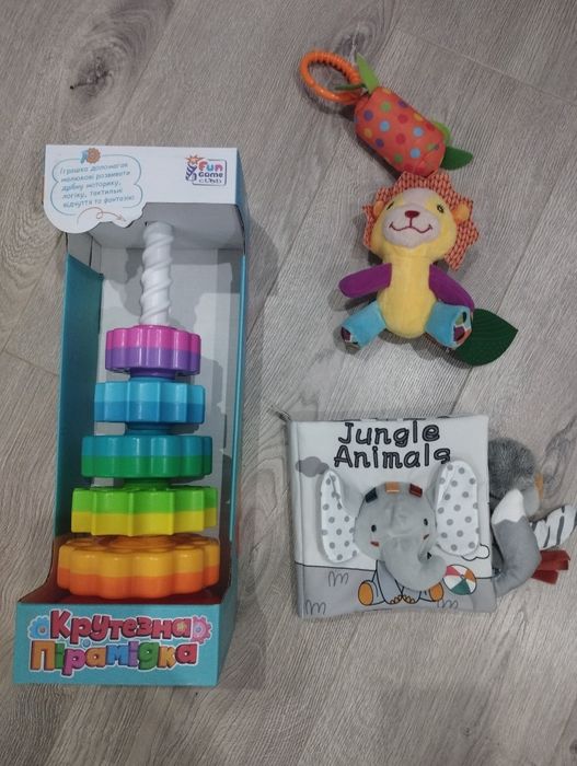 Іграшки брязкальце м'яка книжка чий хвіст