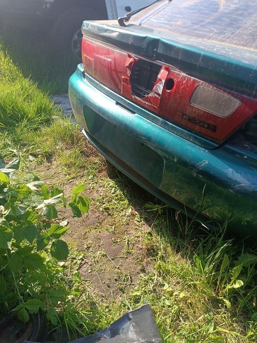 Задній бампер Mazda 323 BA