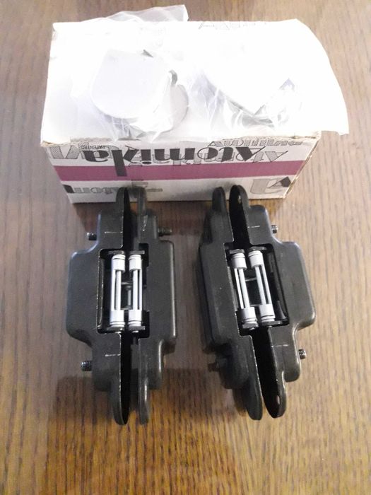 Дверні петлі скритого монтажу