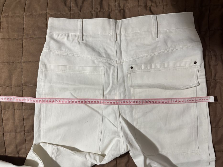 Бавовняні штани від бренду Mango