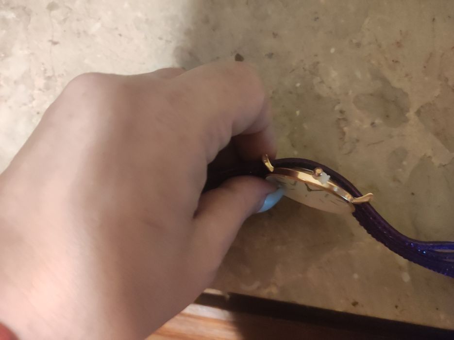 Relógio lilás novo