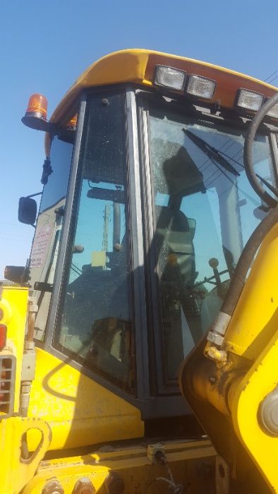SZYBA HIDROMEK waryński koparko - ładowarka 102B, 102S  nr 556