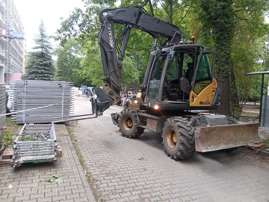 Mecalac 714MW roboczogodziny od roboty koparka Wrocław z operatorem
