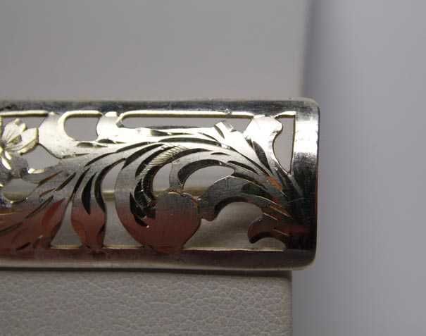 Srebrna broszka wycinane kwiaty handarbeit.