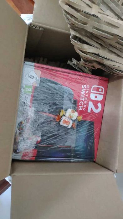 Nintendo Switch 2 + Mario kart world (nova selada)