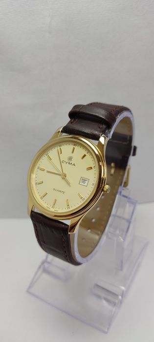 *67*CYMA Le Locle pozłacany