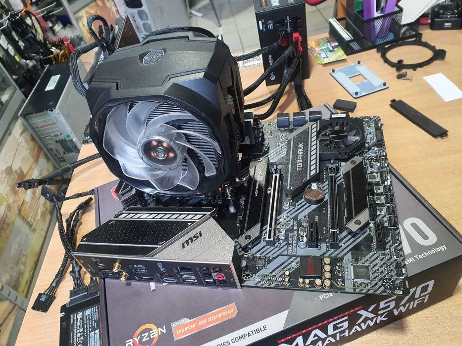 Материнская плата sAM4 MSI x570 tomahawk c Ryzen 5 5600x и кулер.