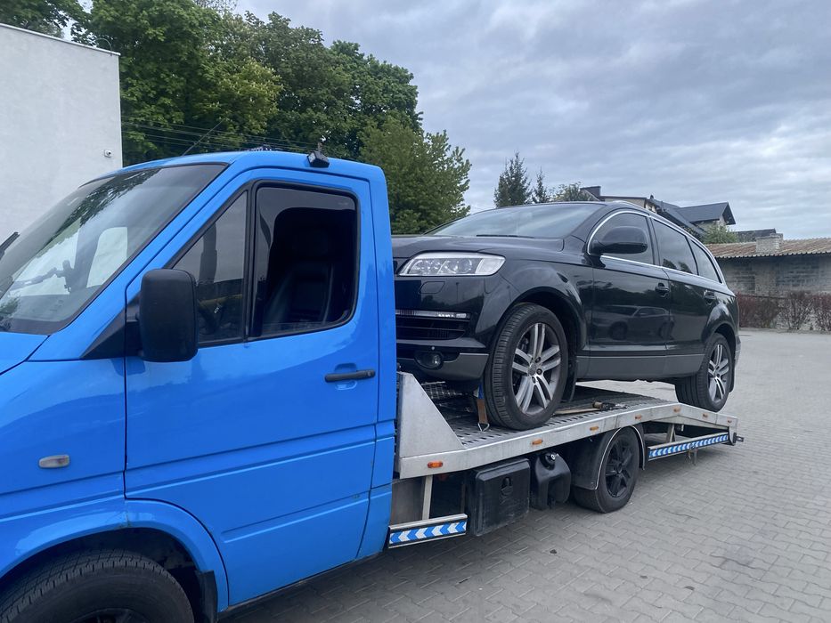 Laweta transport samochodow łodzi przyczep pomoc drogowa