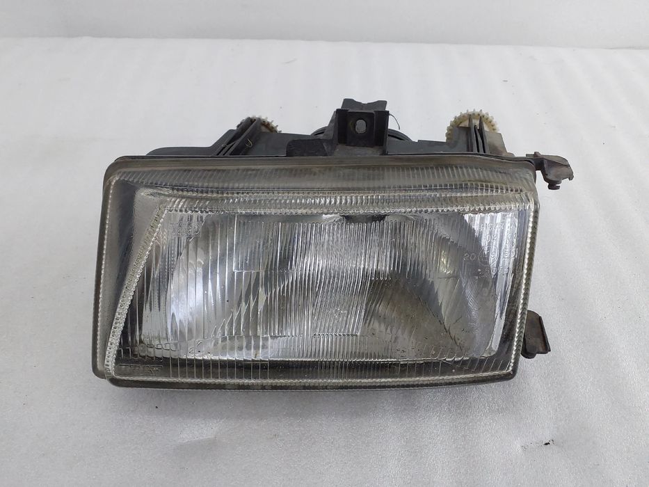 Ótica / farol esquerda SEAT Ibiza II (6K1)