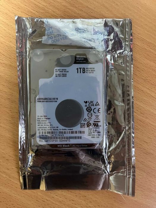 Зовнішні корпуси і жорсткі диски на 1TB 2.5