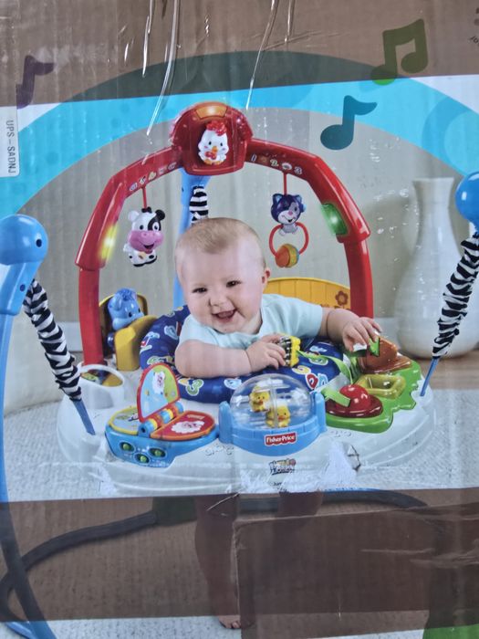 Стрибунці,дитячий ігровий центр Fisher-Price Laugh & Learn Jumperoo.
