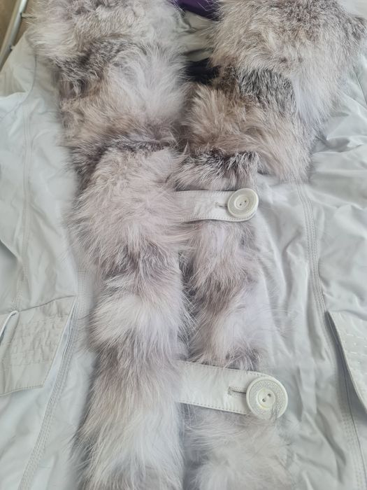 Женский пуховик с мехом