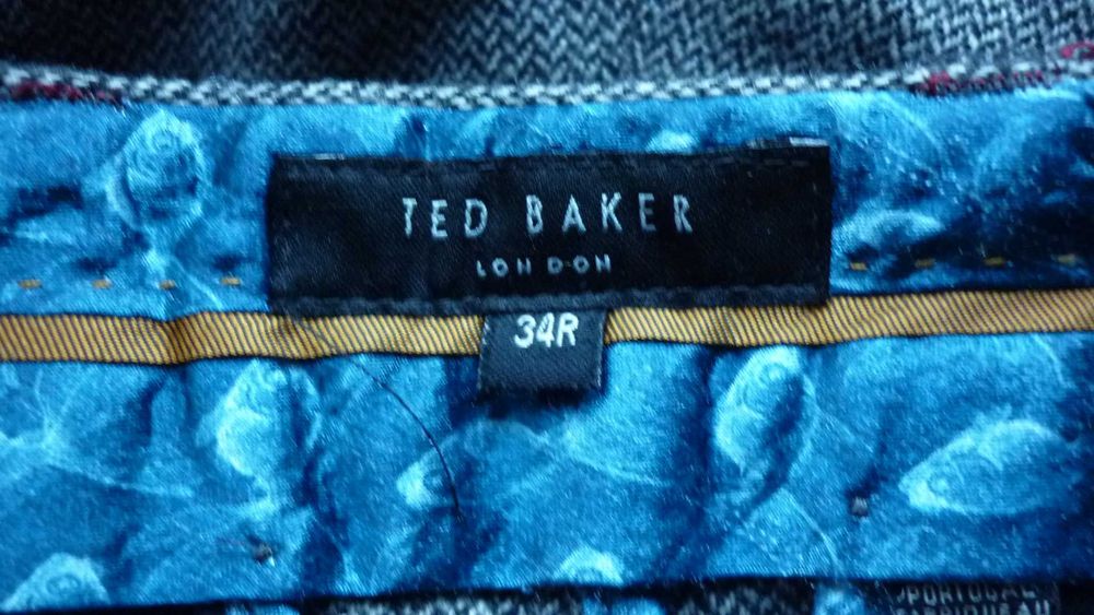 Ted Baker- męskie spodnie wełniane  r; 34