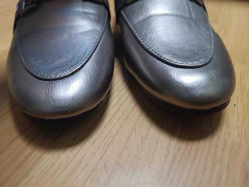 Сріблясті туфлі лофери
Claudia Ghizzani