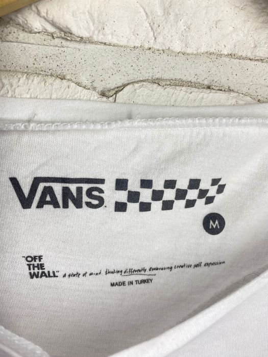 T-shirt vans off the wall