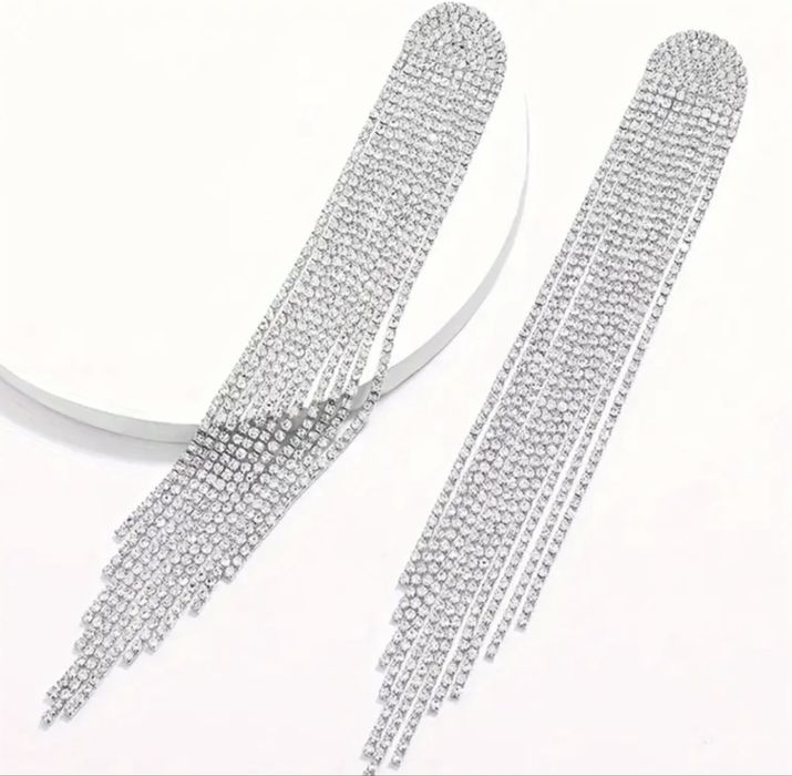 Елегантні довгі сережки