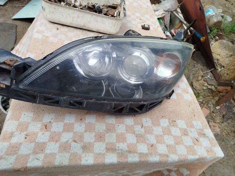 Фара левая Мазда 3 2008 года