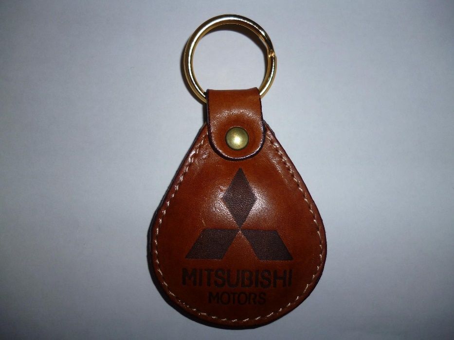 Porta chaves marca carros Honda ou Kia ou Mitshubishi em pele