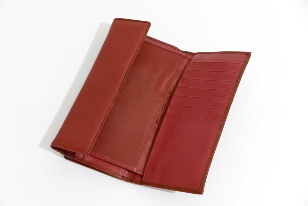 Duży skórzany portfel damski. Miękka, bordowa skóra.