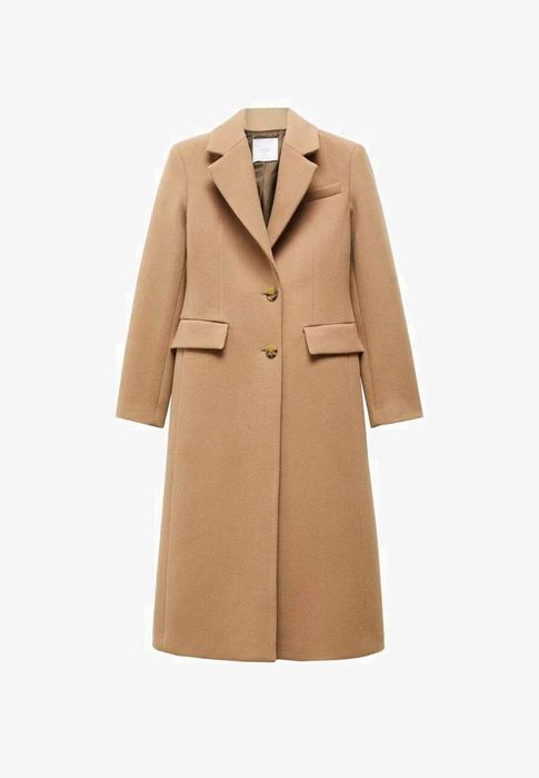 Жіноче пальто бежевого кольору з натуральної шерсті