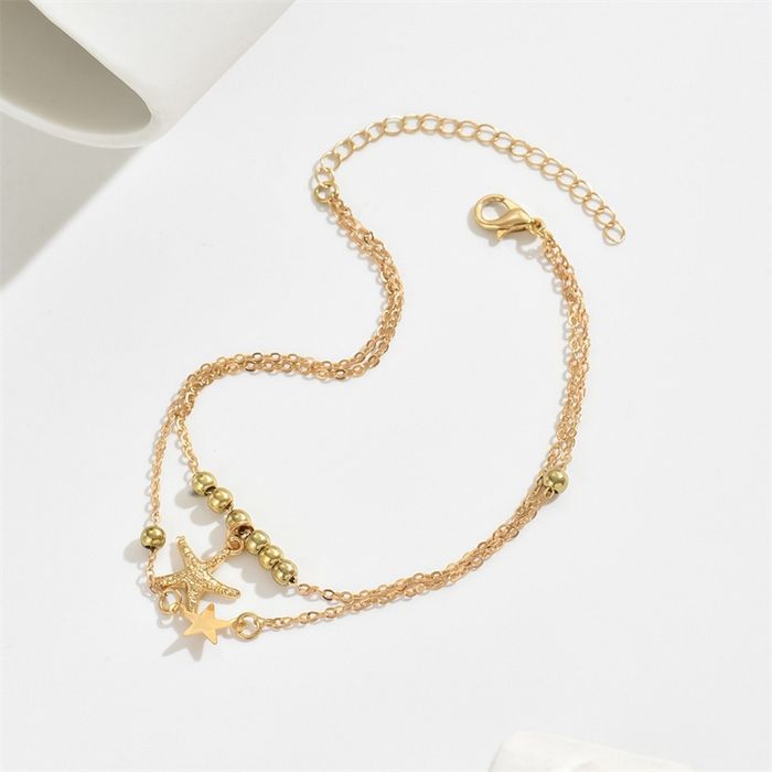 Браслет двошаровий золотого кольору