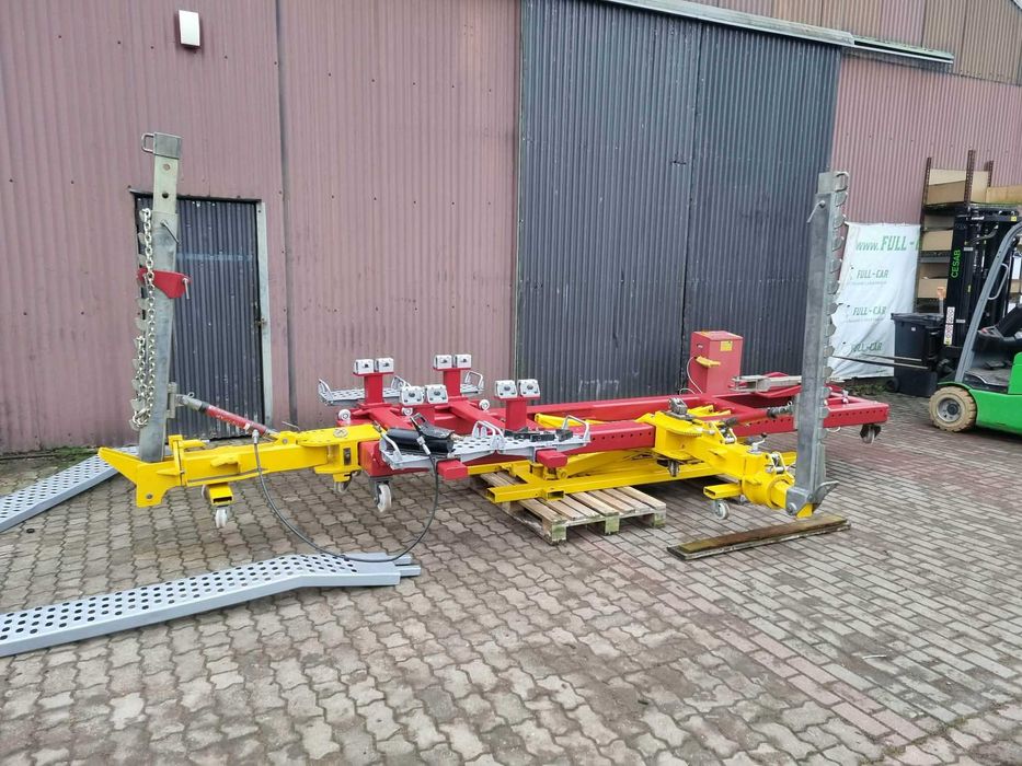 UNICAR TRZY docery  rama plyta blacharska podnosnik nozycowy stan bdb