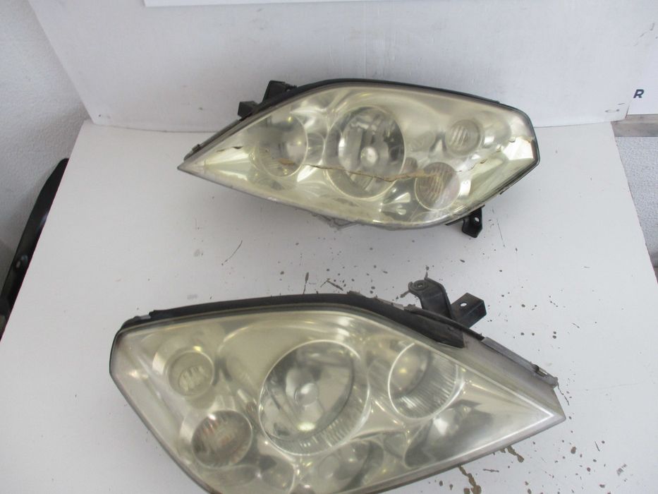 Farol optica Nissan primera 2005 xenon