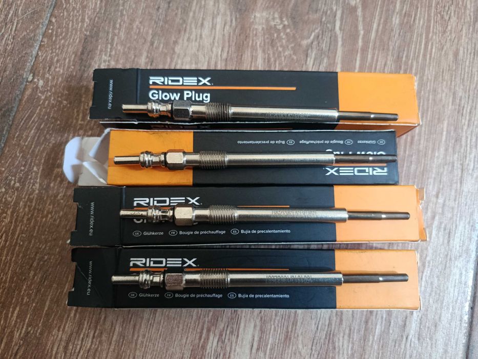 quatro velas de pré-aquecimento (também chamadas de velas de incandescência) da marca RIDEX