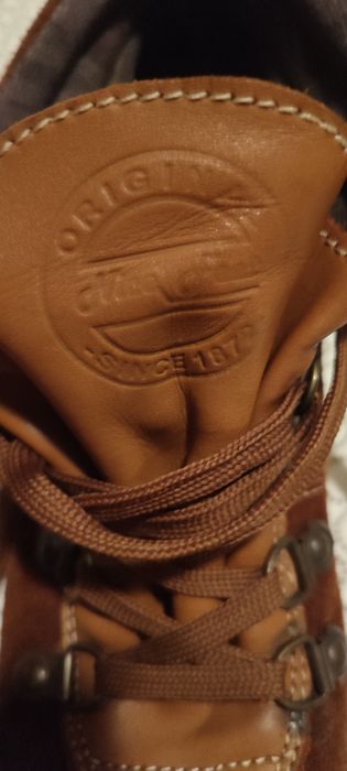 Botas de pele castanhas