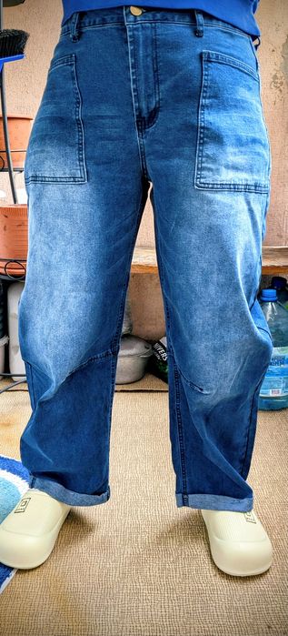 Жіночі нові джинси еластичні з широкими штанинами