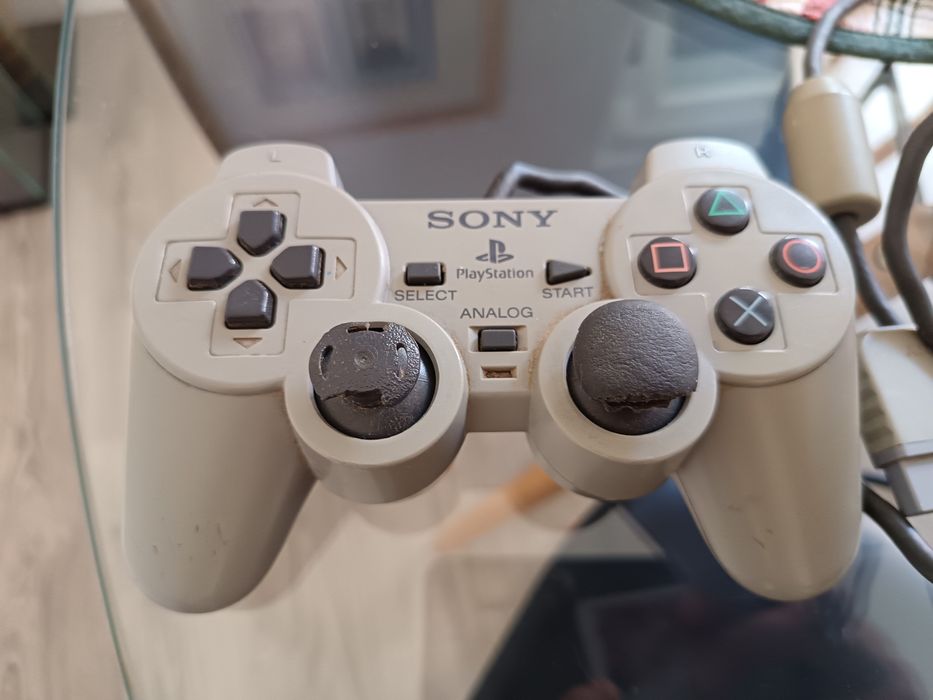 Vendo psx com comando e cabos