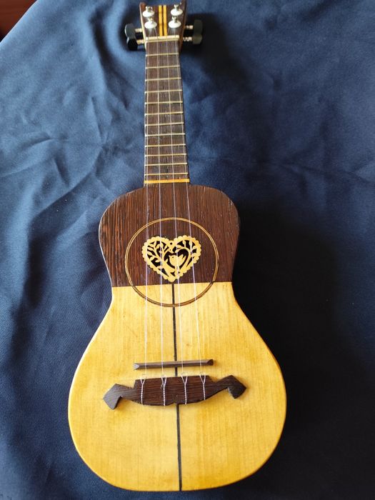 Maravilhoso cavaquinho Novo,