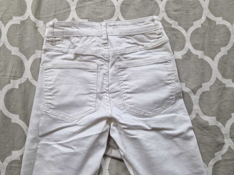 Spodnie białe Sinsay rozm 32