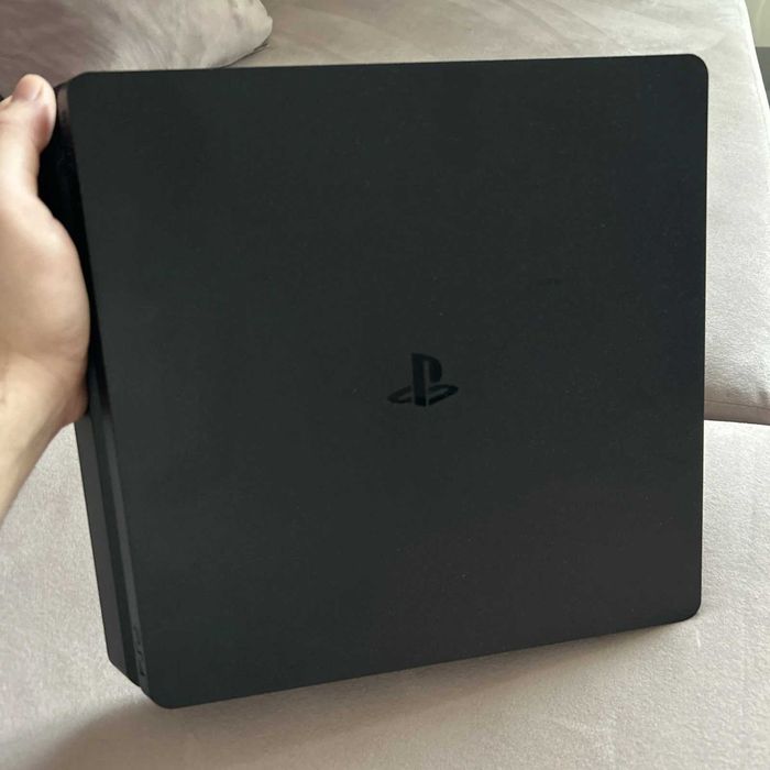 PS4 Slim 1TB + Jogo FIFA 17 + 1 Comando + Cabos