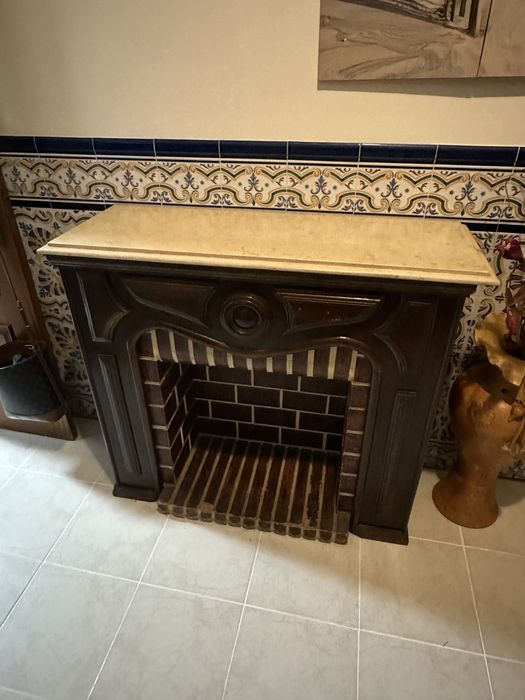 Decorative fireplace with marble top