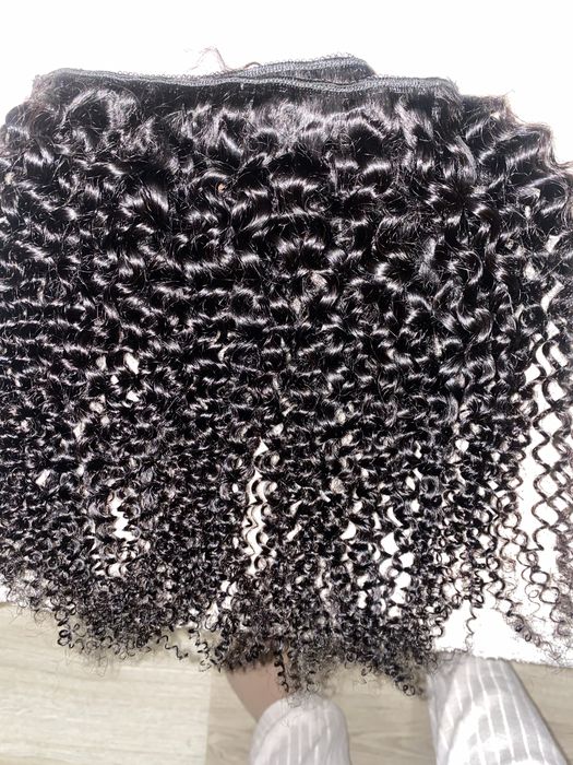 Clic de Cabelo cacheado humano