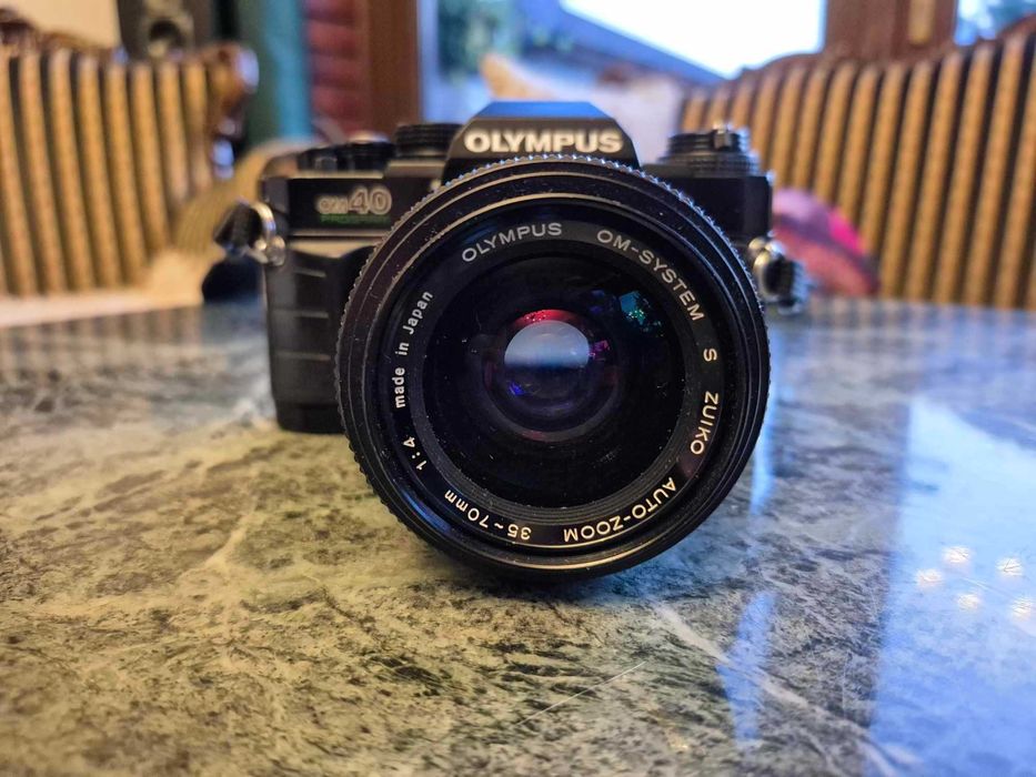 Olympus OM40 Program