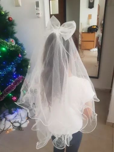 Фата с бантиком на гребешке