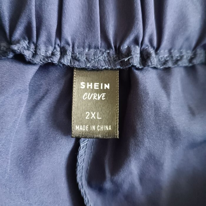 Shei Eleganckie spodnie damskie szeroka nogawka