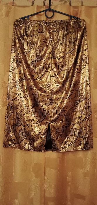 Продам юбку золотистого цвета.