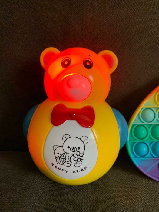 Игрушка музыкальная неваляшка и пластина анти стресс