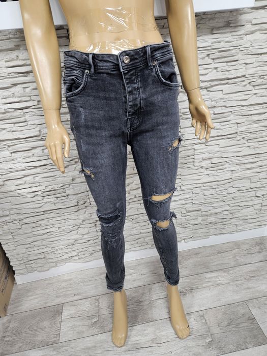 Super modne spodnie jeansowe damskie czarne Zara rozmiar 42 z przetarc