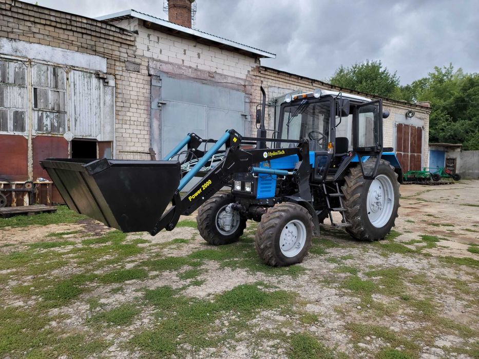 Быстросйомный фронтальный погрузчик кун Юмз