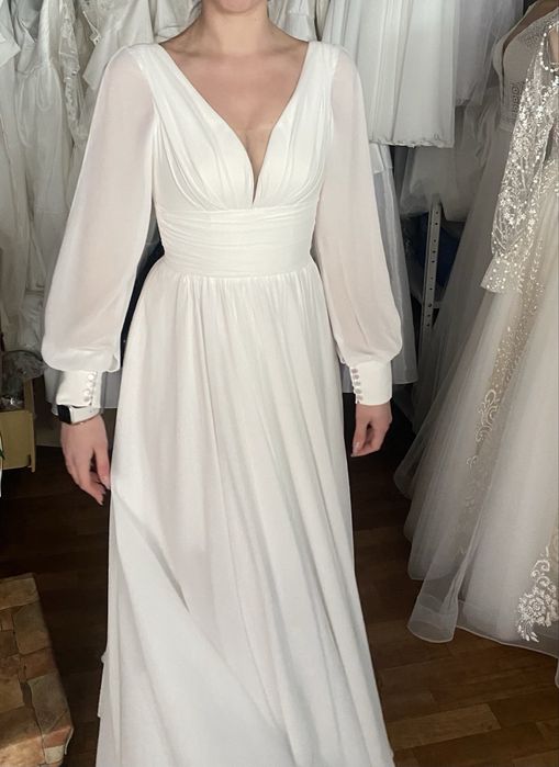 Продам весільну сукня 48 розміру