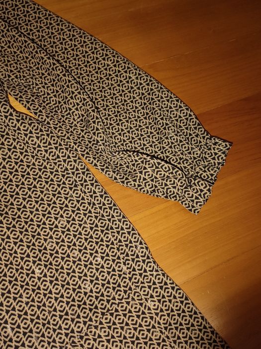 Vestido com tons dourados